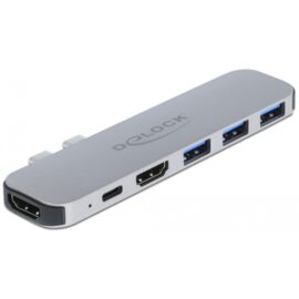 Das Bild zeigt eine Dockingstation für MacBook von der Marke DeLock in der Farbe Grau. Sie hat mehrere Anschlüsse, darunter USB-Ports, HDMI-Ausgang und einen SD-Karten Slot. Das Design ist schmal und modern, passend zum ästhetischen Stil eines MacBooks, und die Station dient dazu, die Anschlussmöglichkeiten von kompatiblen MacBooks zu erweitern.