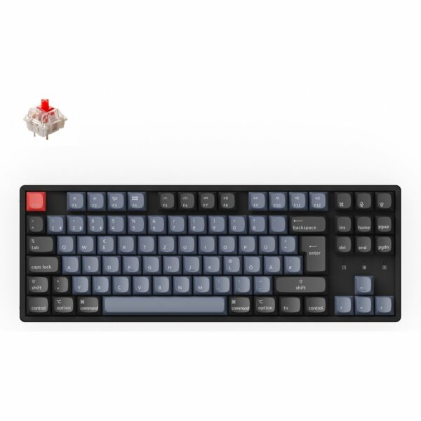 Das Bild zeigt die K8 Pro Gaming-Tastatur von Keychron. Diese Tastatur hat ein schlankes, kompaktes Design mit mechanischen Tasten, die durch Farbkontrast für eine gute Erkennbarkeit angepasst sind. Eine abnehmbare rote Taste ist ebenfalls zu sehen und deutet auf die Anpassbarkeit und das modulare Design der Tastatur hin. Das Bild dient dazu, die Ästhetik, das Layout und die Funktionalitäten der Tastatur zu veranschaulichen.
