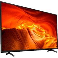Das Bild zeigt den 50-Zoll LED-Fernseher BRAVIA KD-50X73K von Sony, der auf einem Standfuß steht und ein Bild mit lebhaften Farben und hochauflösenden Details einer Canyon-Szenerie anzeigt. Der Zweck des Bildes ist es, die Bildqualität und das Design des Fernsehers zu demonstrieren.